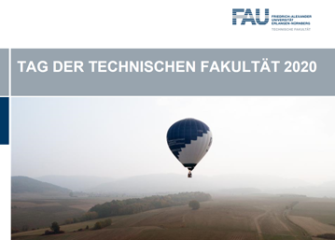 Hot air balloon above a field