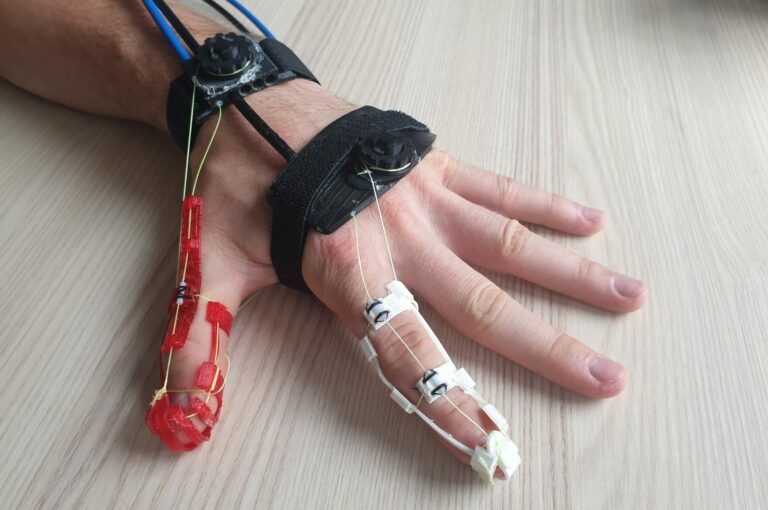Restoring hand function with intelligent neuro-orthoses